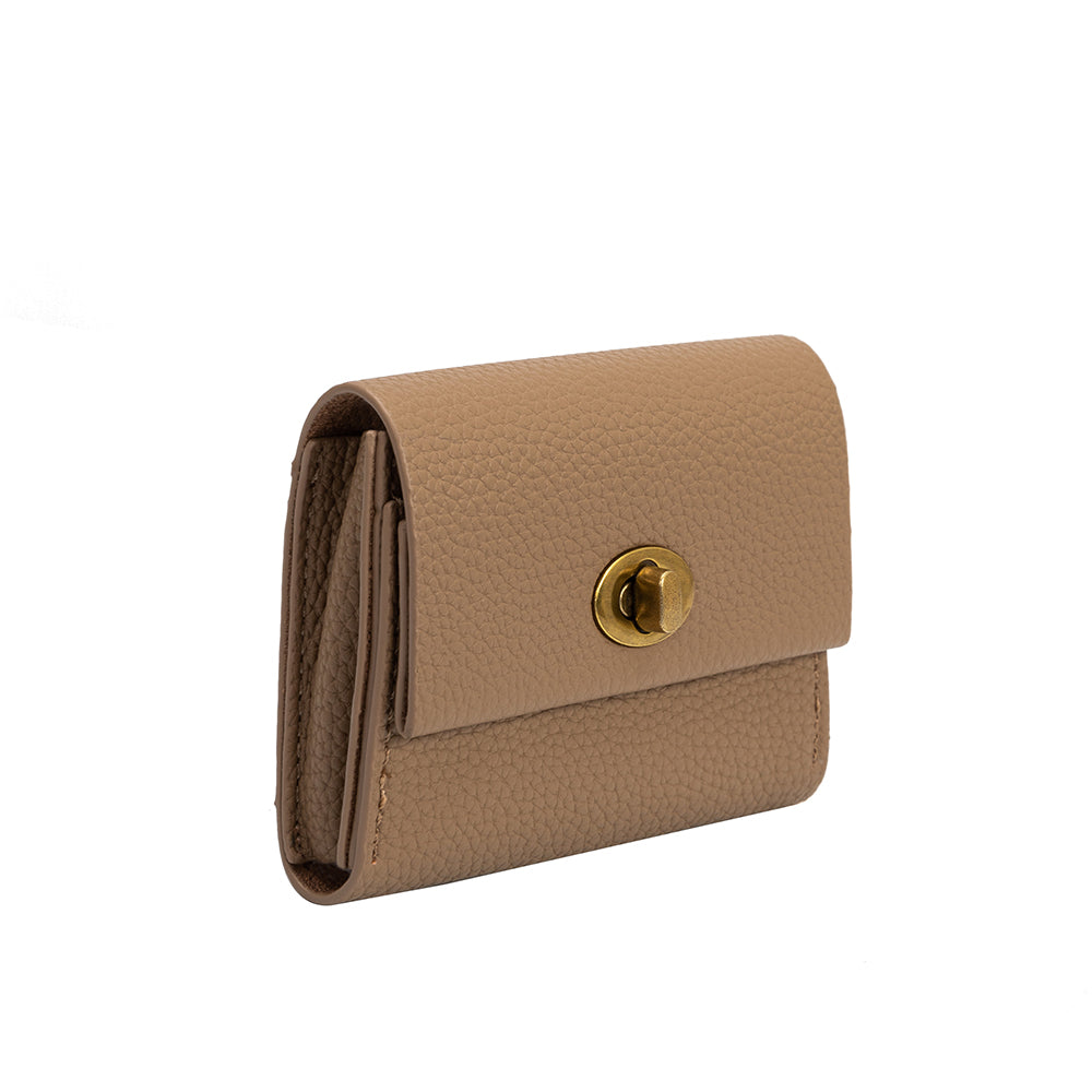 A small taupe pebble vegan leather card case wallet with a gold clasp.