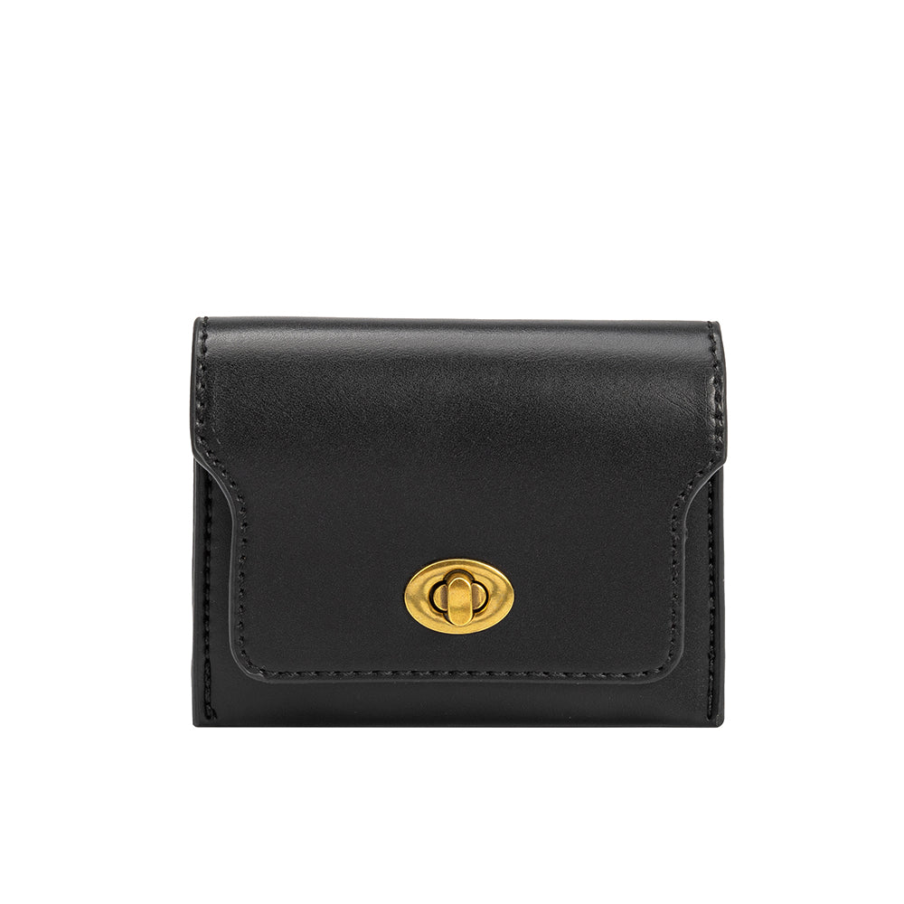 A small vegan leather card case wallet with a gold clasp.