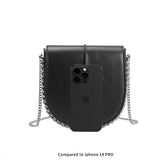 A black vegan leather crossbody handbag with silver handle.