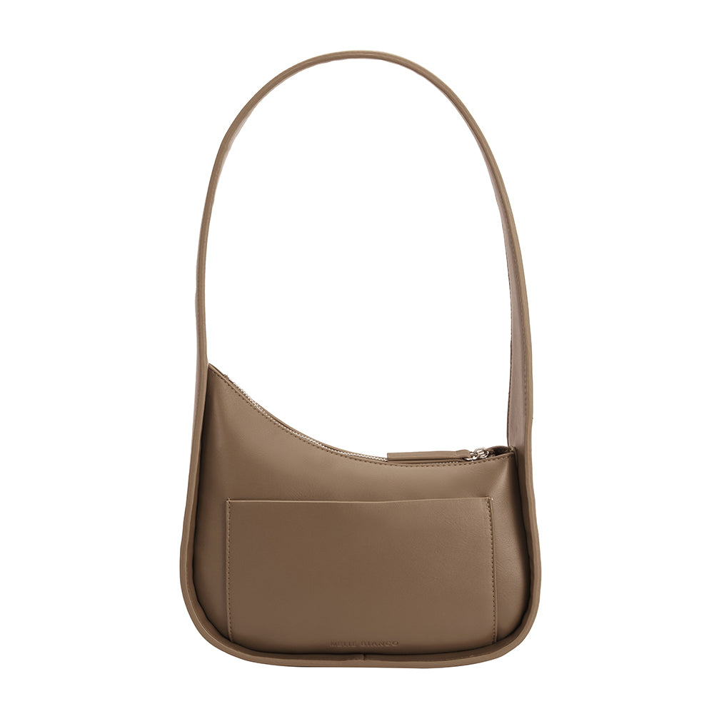 A taupe asymmetrical vegan leather structured shoulder bag.