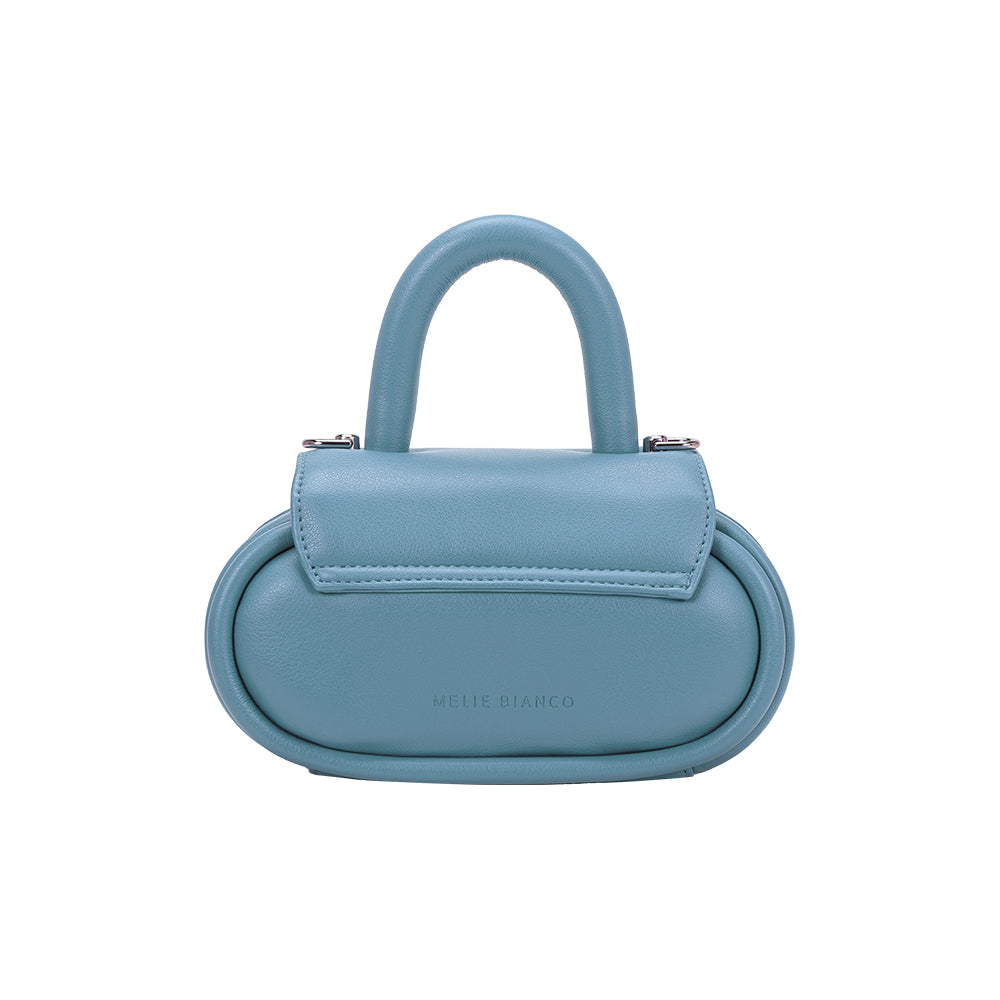 A sky oval shaped bag with a curved handle crossbody handbag