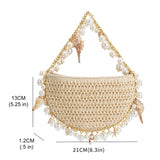 A measurement reference image for a small crochet straw top handle bag with seashell details along the handle.