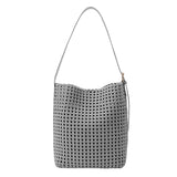 A large gray woven nylon tote bag with a zip pouch inside.