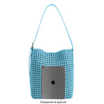 An ipad size comparison image for a large woven nylon tote bag with a zip pouch inside.