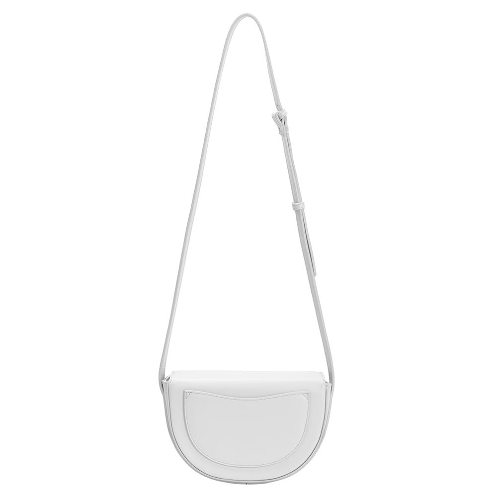 A small white vegan leather crossbody bag with a wavy front flap closure.