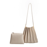 A bone pleated vegan leather shoulder bag with zip pouch.