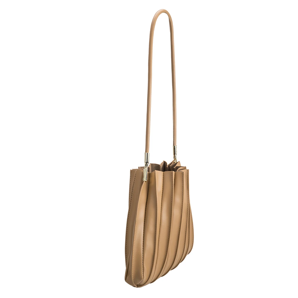 A taupe pleated vegan leather shoulder bag with gold hardware. 