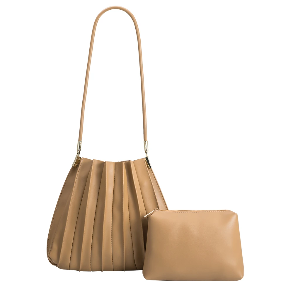 A taupe pleated vegan leather shoulder bag with a taupe zip pouch. 