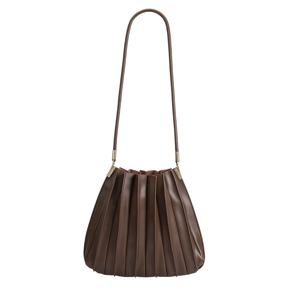 A chocolate pleated vegan leather shoulder bag.