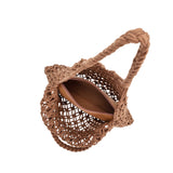 A medium chocolate crochet shoulder bag with a braided handle and a zip pouch inside. 