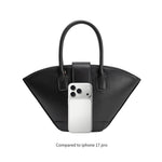 Black handbag compared to iPhone 17 Pro on a white background