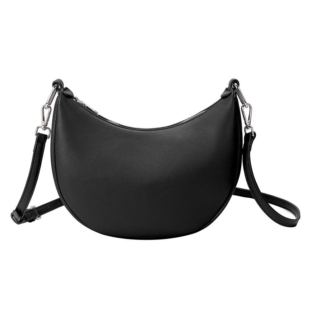 A black crescent shaped vegan leather crossbody bag with silver hardware. 