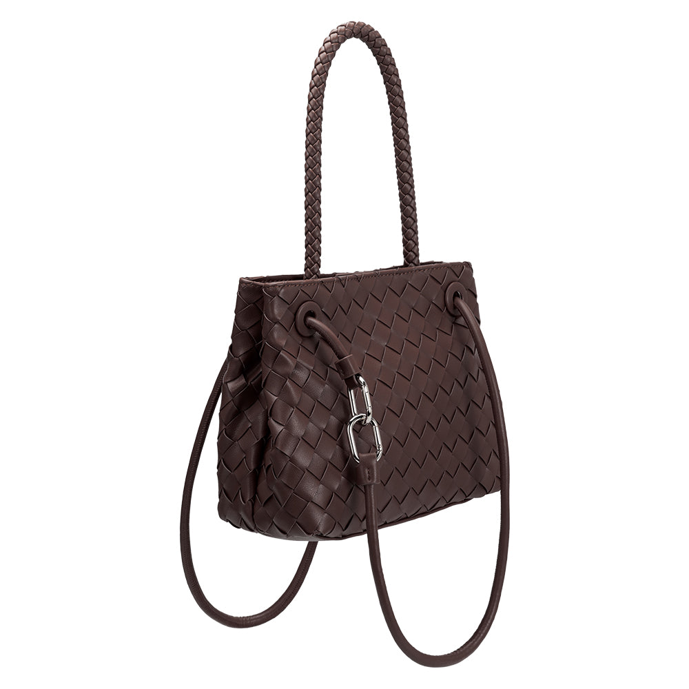 A espresso hand woven vegan leather crossbody bag with a curved handle. 