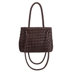 An espresso hand woven vegan leather crossbody bag with curved handle.