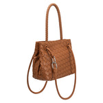 A tan hand woven vegan leather crossbody bag with a curved handle. 