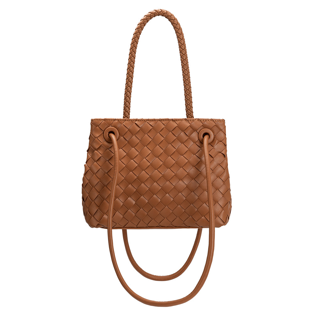 A tan hand woven vegan leather crossbody bag with a curved handle. 