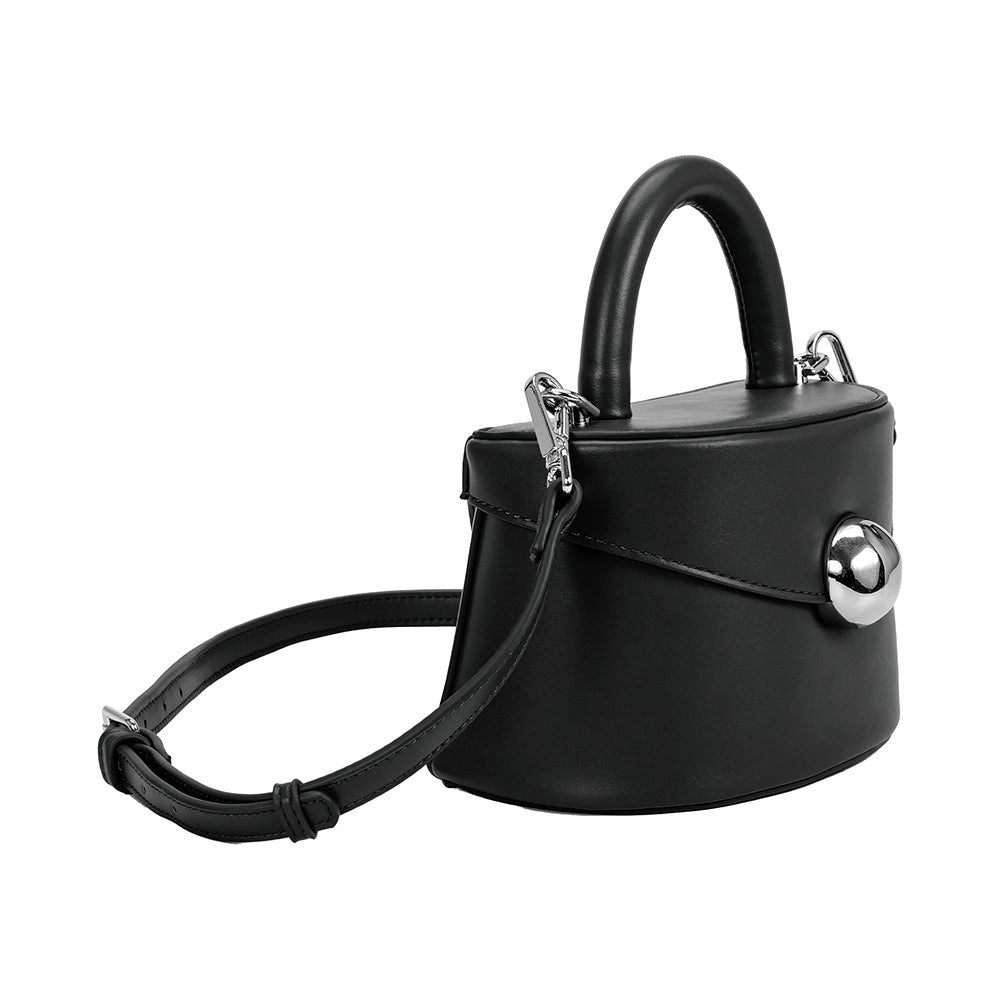 A small black recycled vegan leather top handle bag with silver hardware. 