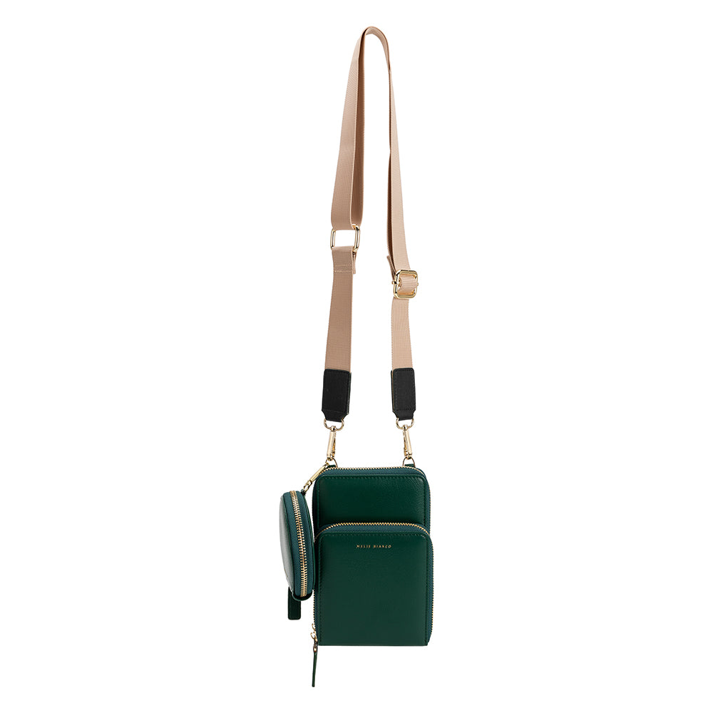 A small green vegan leather crossbody bag with a coin pouch.