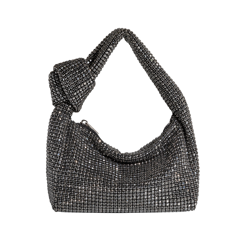 A small black crystal encrusted top handle bag with a knot.