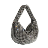 A small silver crystal encrusted crossbody bag.