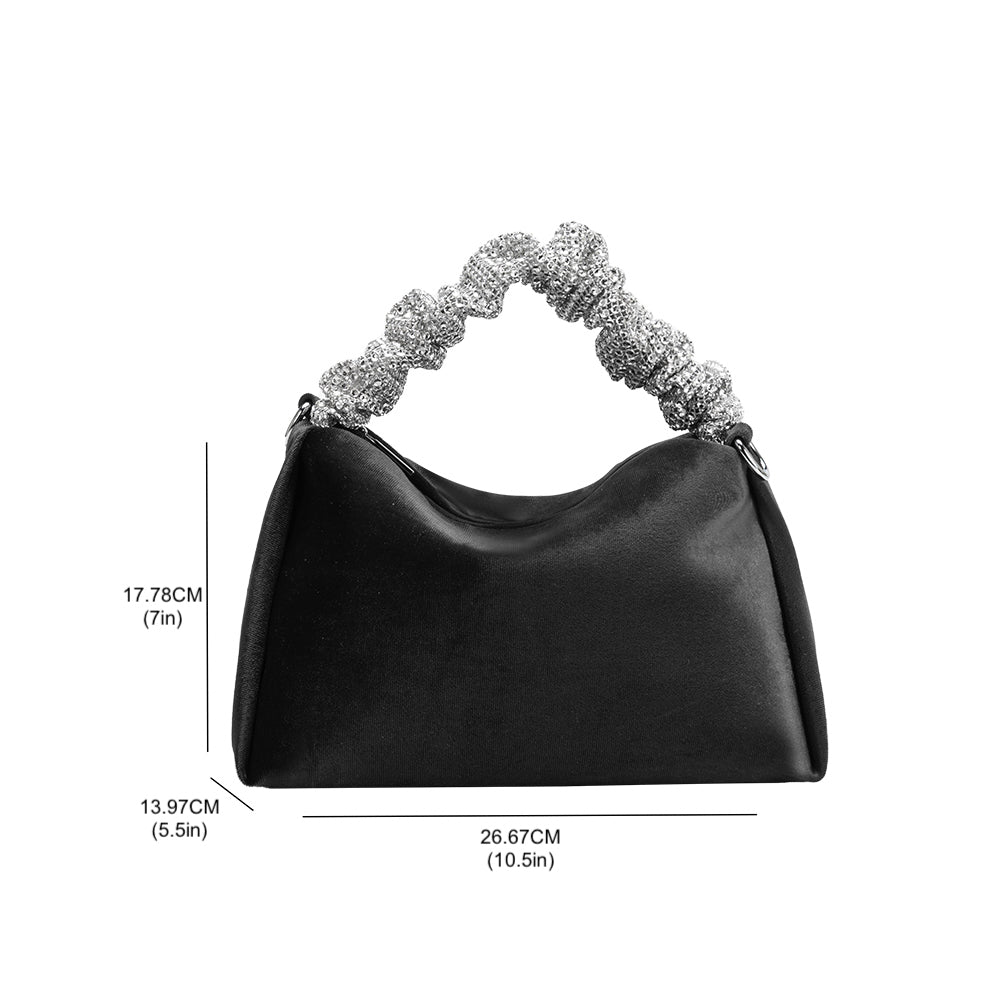 A measurement reference image for a medium velvet top handle bag with a silver encrusted handle. 