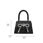 A measurement reference image for a mini velvet top handle bag with an encrusted bow.