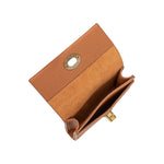 A small saddle vegan leather card case wallet with a gold clasp. 