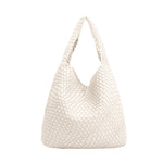 A large off white woven vegan leather shoulder bag with a zip pouch inside