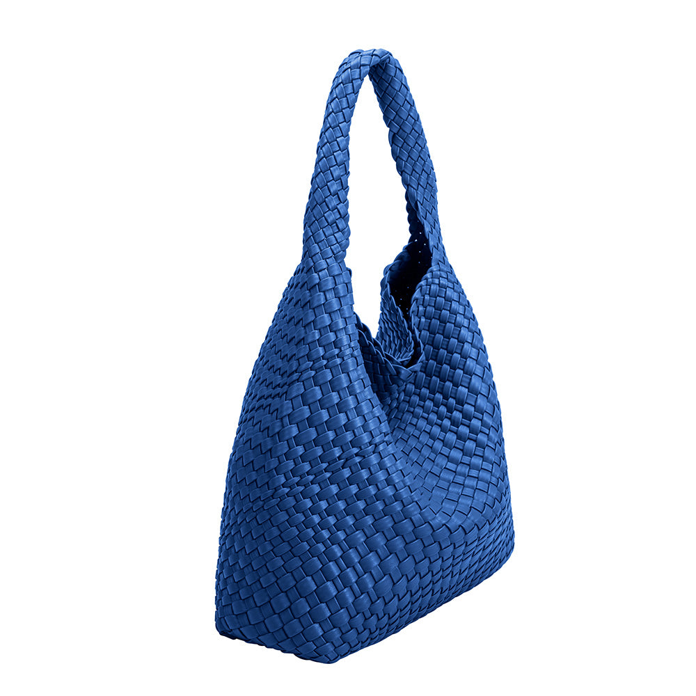 a large cobalt woven vegan leather shoulder bag with a zip pouch inside