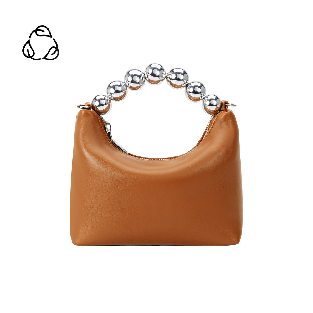 A small tan recycled vegan leather crossbody bag with a silver beaded handle. 
