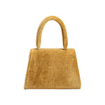 A mini gold velvet top handle bag with a silver encrusted bow.