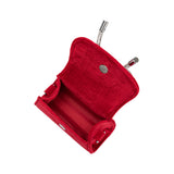 A mini red velvet top handle bag with a silver encrusted bow.