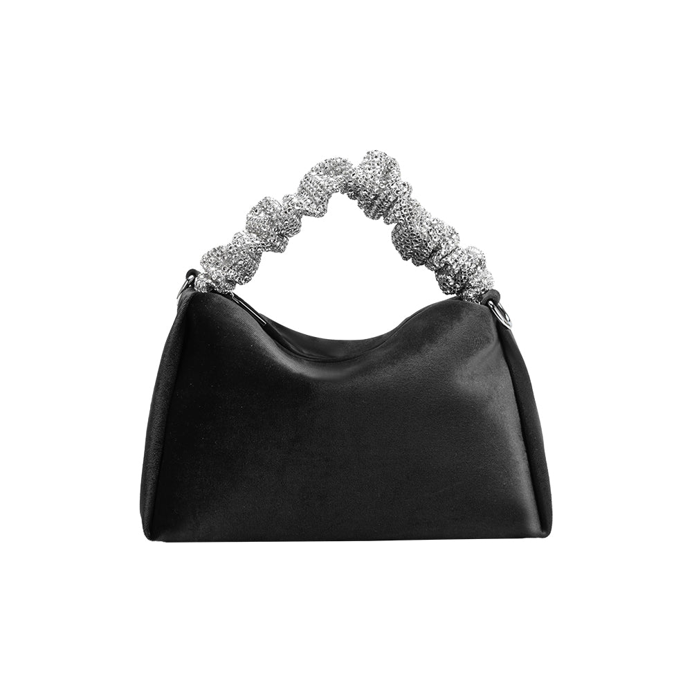 A medium black velvet top handle bag with silver encrusted handle. 
