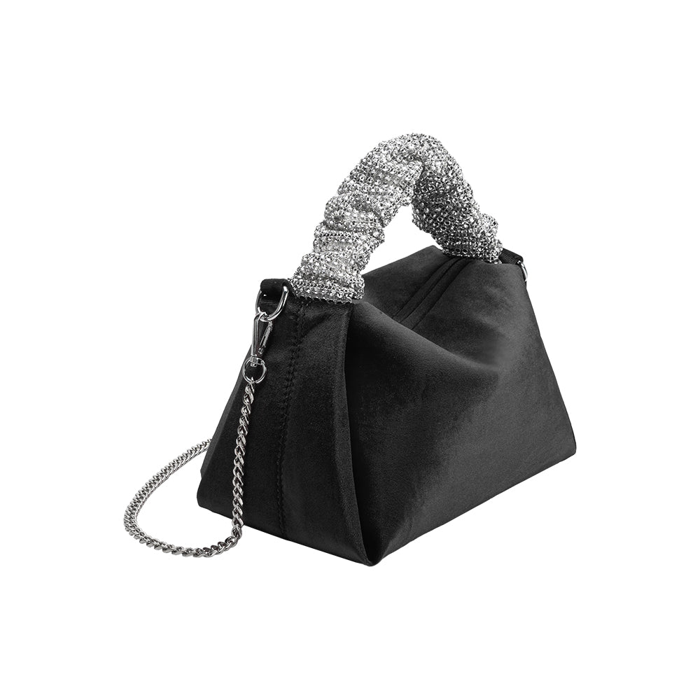 A medium velvet black top handle bag with a silver encrusted handle. 