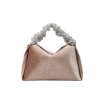 A medium taupe velvet top handle bag with a silver encrusted handle. 