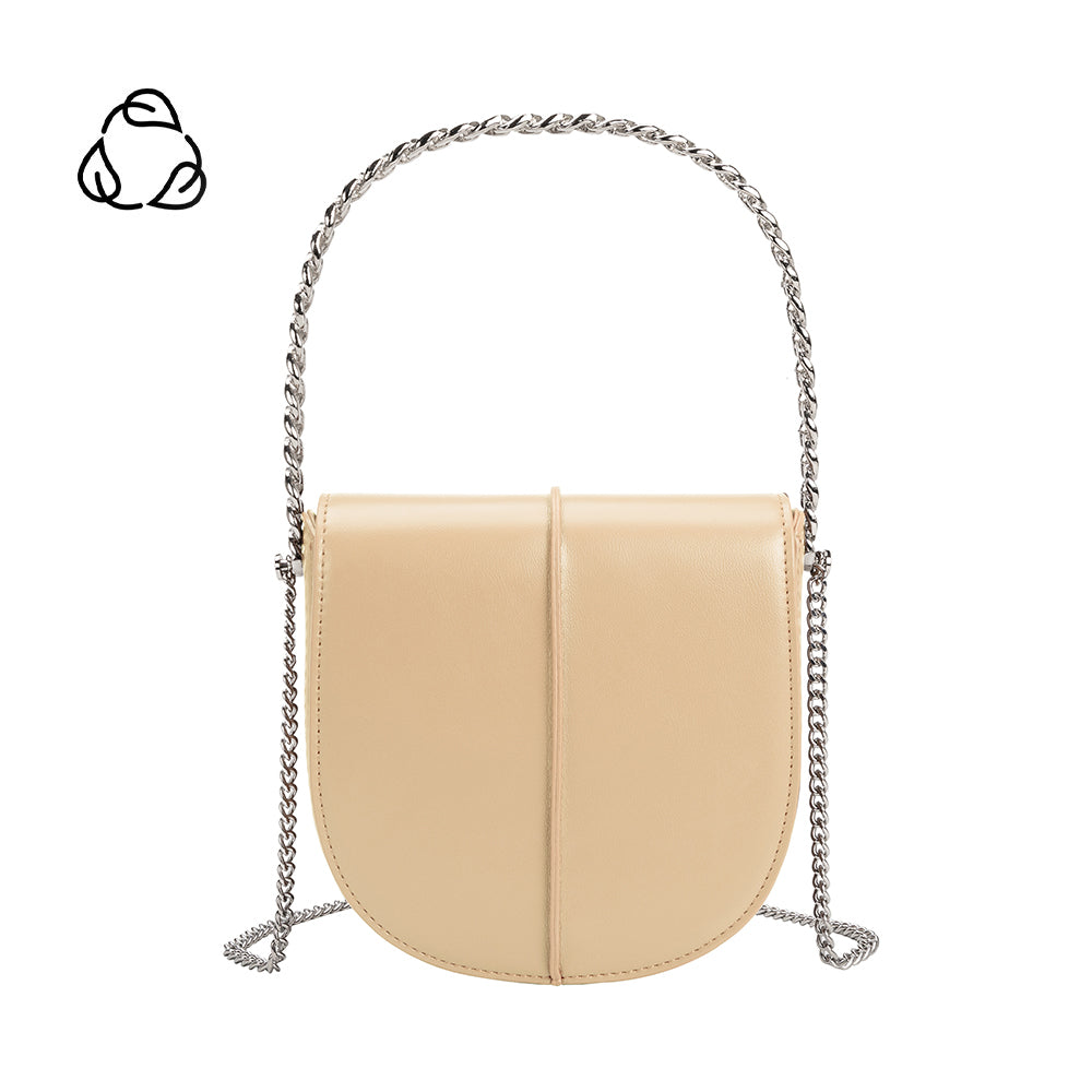 A nude vegan leather crossbody handbag with silver handle. 