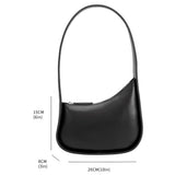 A measurement reference image for a asymmetrical vegan leather structured shoulder bag.