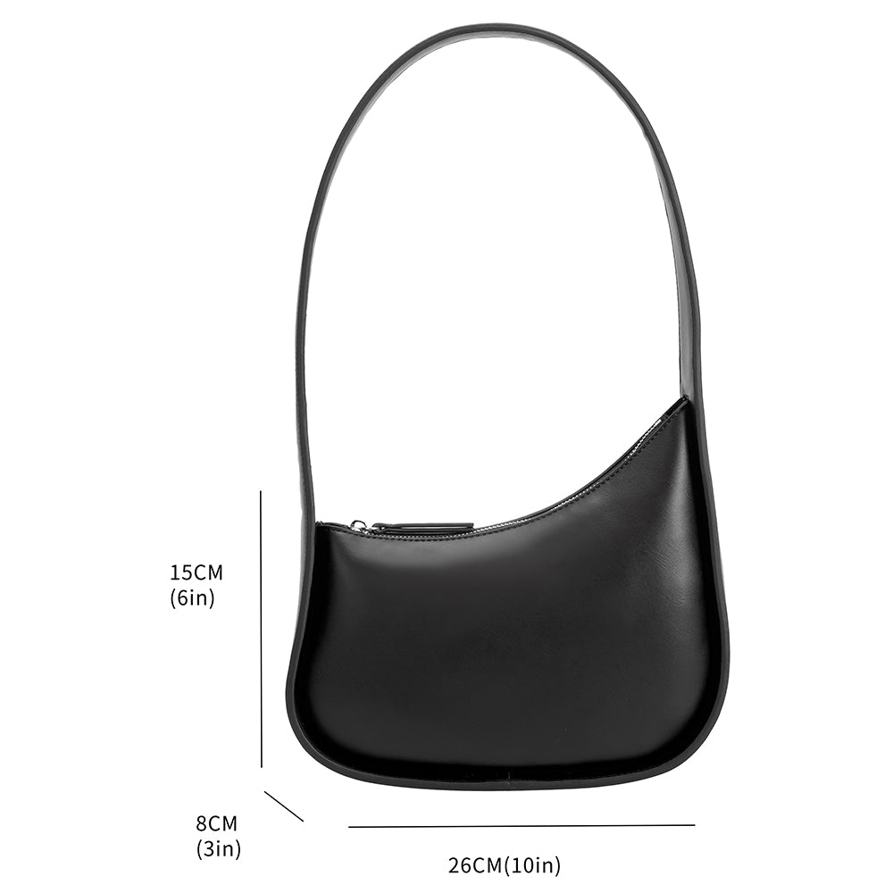 A measurement reference image for a asymmetrical vegan leather shoulder bag with structured handle. 