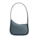 A slate asymmetrical vegan leather shoulder bag with a structured handle. 