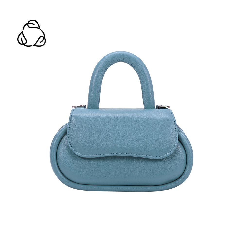 A sky oval shaped bag with a curved handle crossbody handbag. 