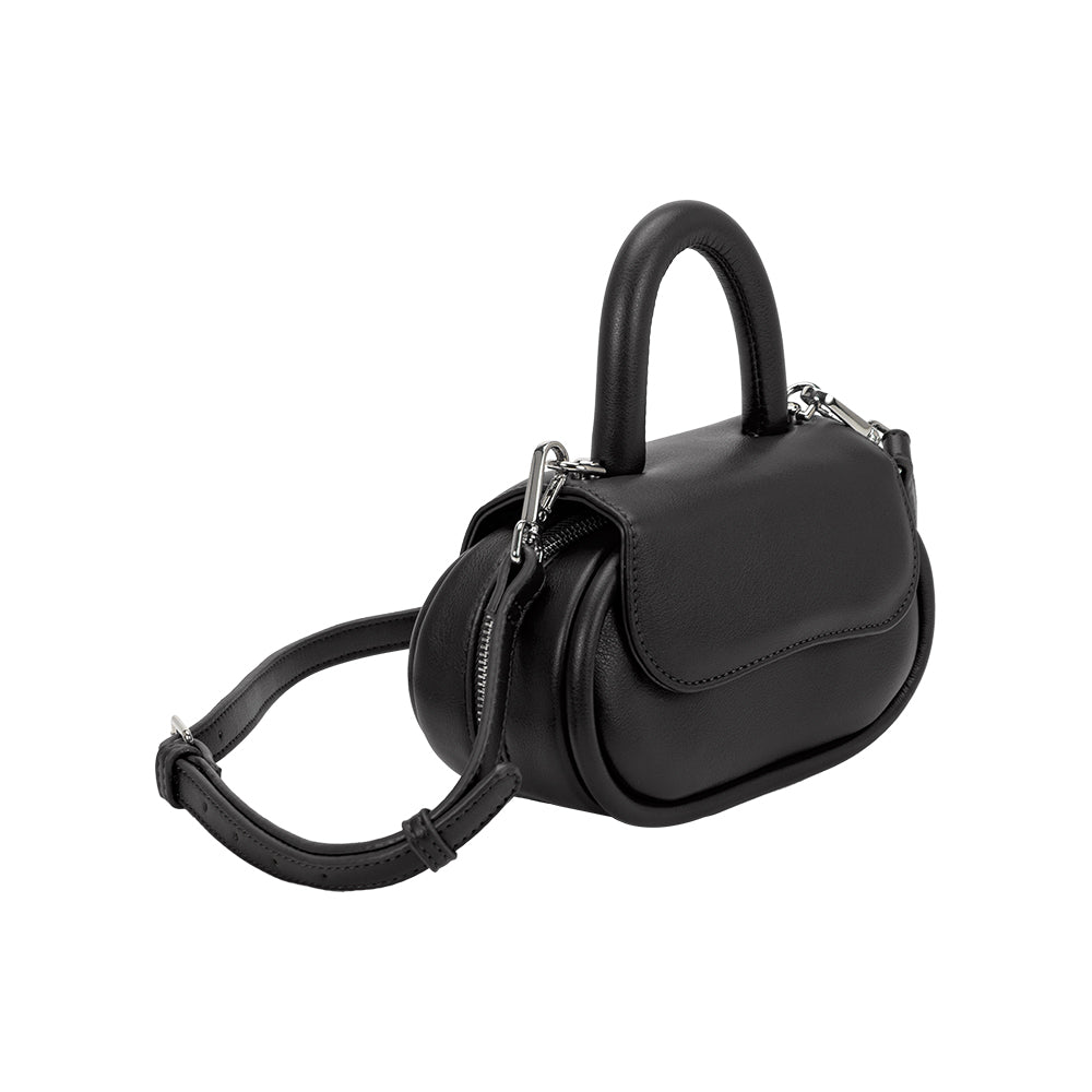 A black oval shaped bag with a curved top handle crossbody handbag. 