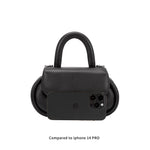 An Iphone 14 Pro size reference photo for a black oval shaped crossbody handbag.