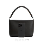 A iphone 14 Pro size comparison image for a small recycled vegan leather crossbody handbag. 