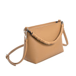 A nude small recycled vegan leather crossbody handbag with a woven strap. 
