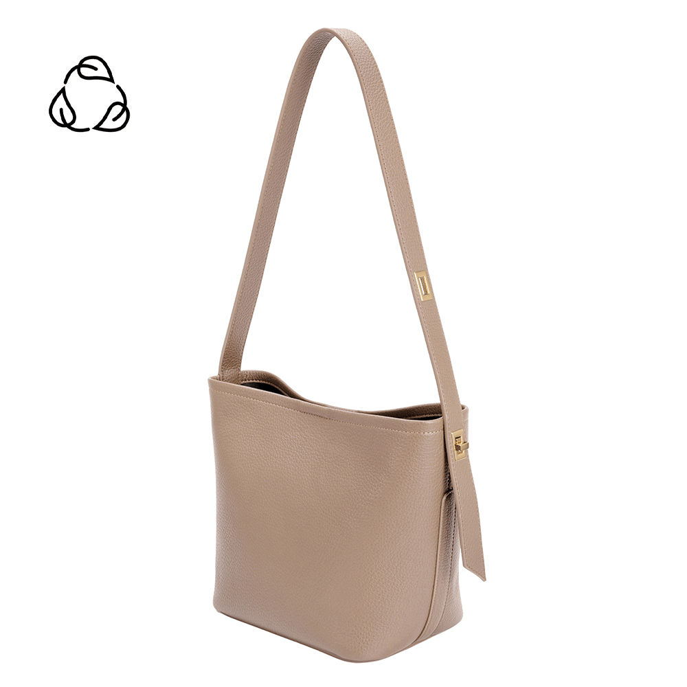 A taupe recycled vegan leather shoulder bag with adjustable strap.