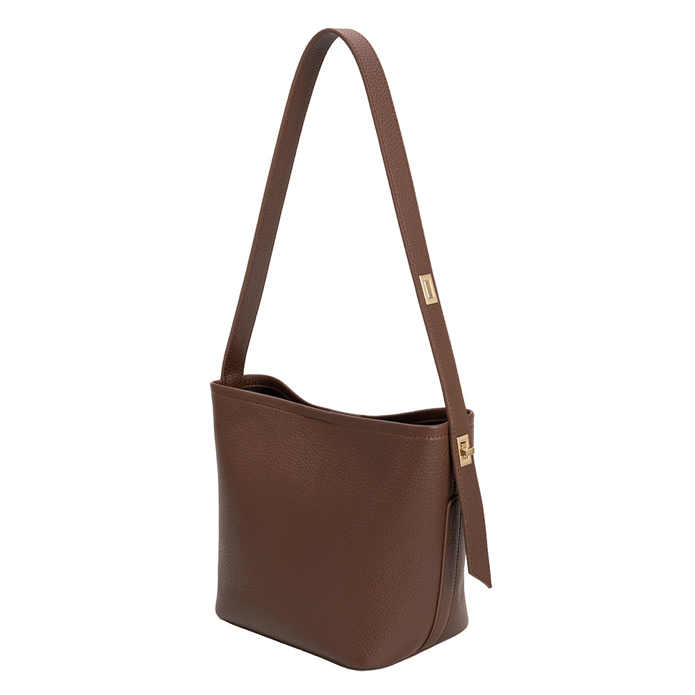 An espresso recycled vegan leather shoulder bag with an adjustable strap.
