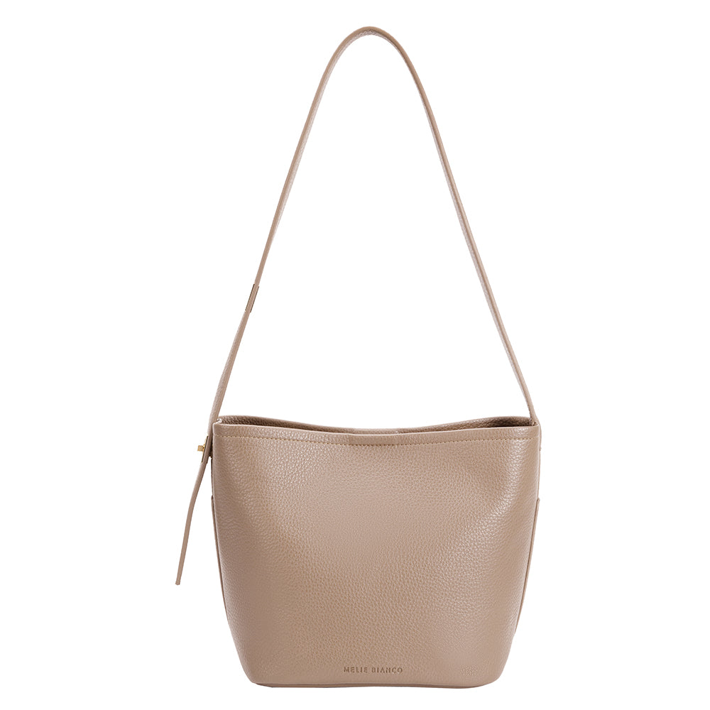 A taupe recycled vegan leather shoulder bag with adjustable strap. 
