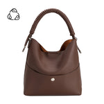 A chocolate pebble vegan leather tote bag with a spiral handle. 