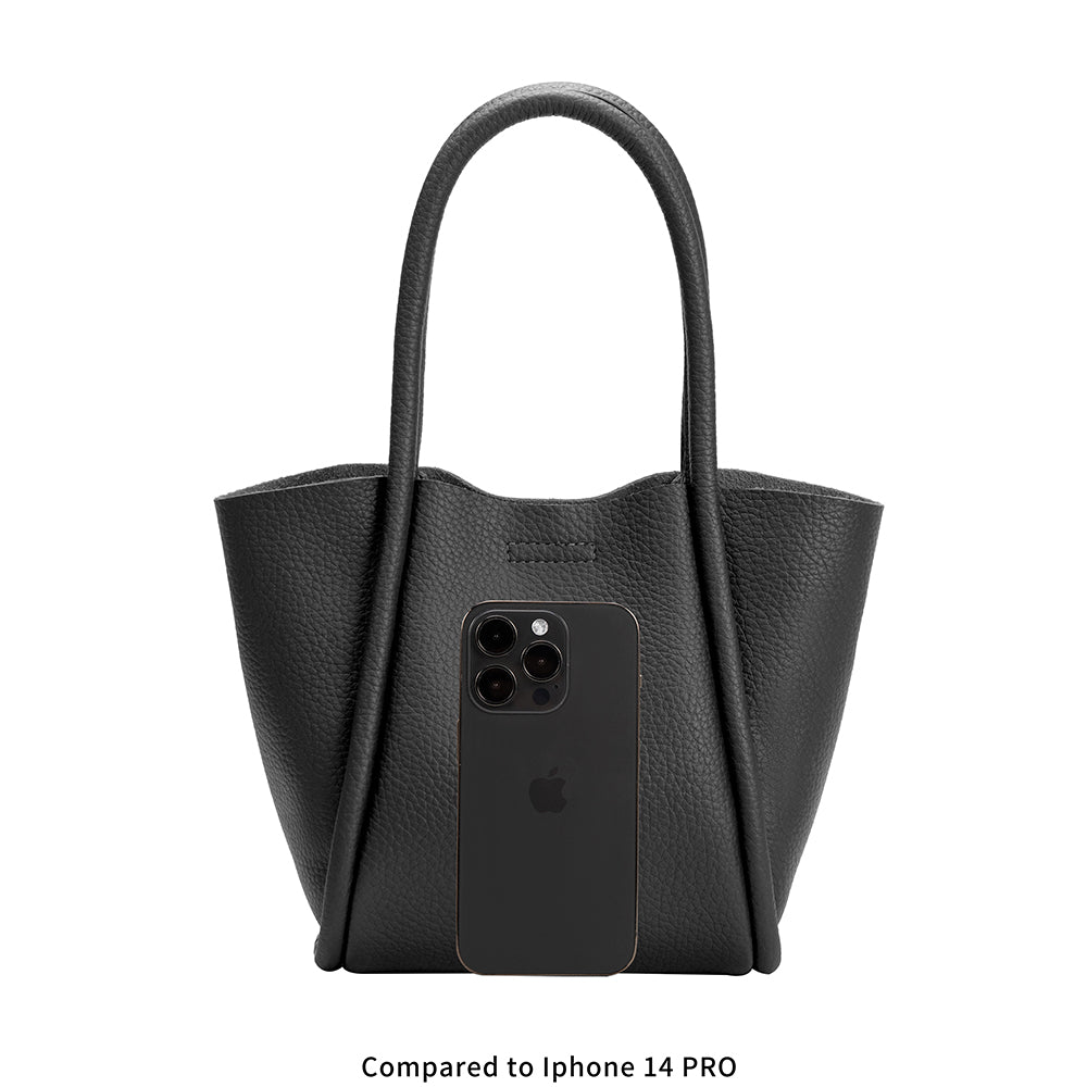 An iphone 14 pro size comparison image for a small recycled vegan tote bag.