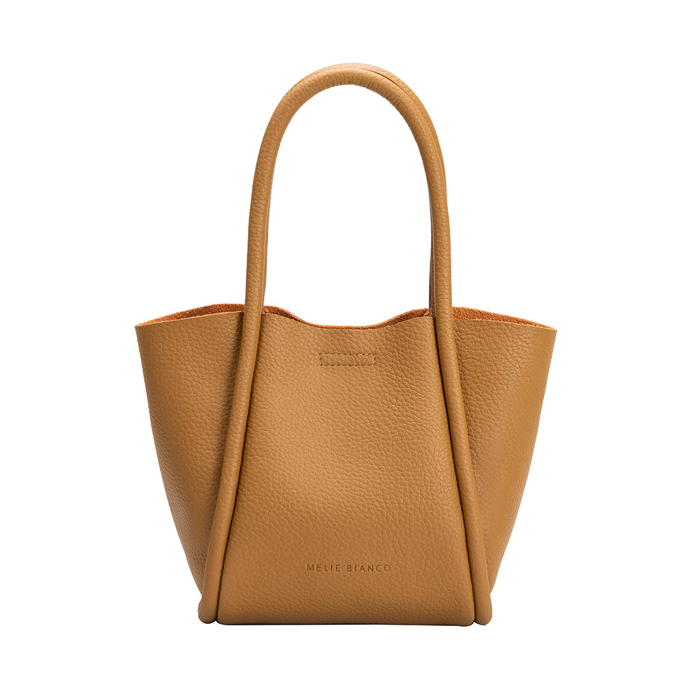 A small tan recycled vegan leather tote bag.